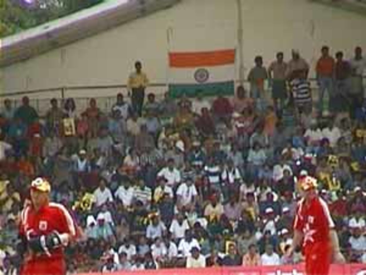 A view of the crowd enjoying the Indians amassing runs, India v Zimbabwe (2nd ODI), Coca-Cola Singapore Challenge, 1999-2000, Kallang Ground, Singapore, 4 Sep 1999.