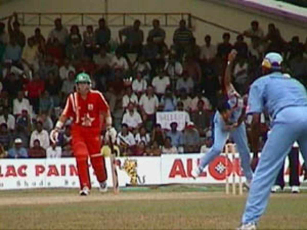 Prasad after releasing his delivery, India v Zimbabwe (2nd ODI), Coca-Cola Singapore Challenge, 1999-2000, Kallang Ground, Singapore, 4 Sep 1999