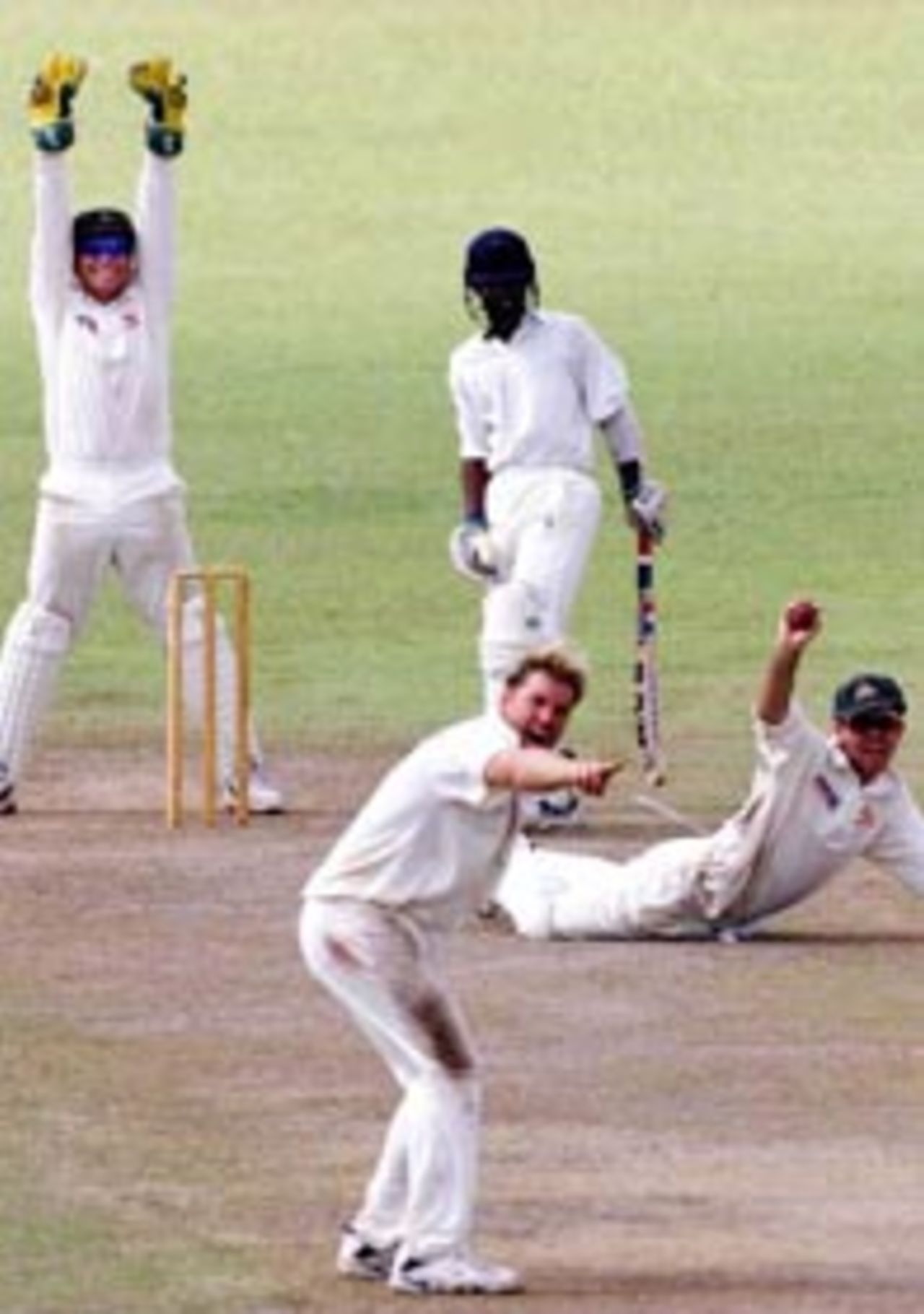 5 Sep 1999: Ricky Ponting of Australia dives for a miraculous catch off Chamara Silva but it was given not out, as Shane Warne and Ian Healy also appeal, during day three of the tour match between the Sri Lanka Board XI and Australia at Saravanamuttu Stadium, Colombo, Sri Lanka.