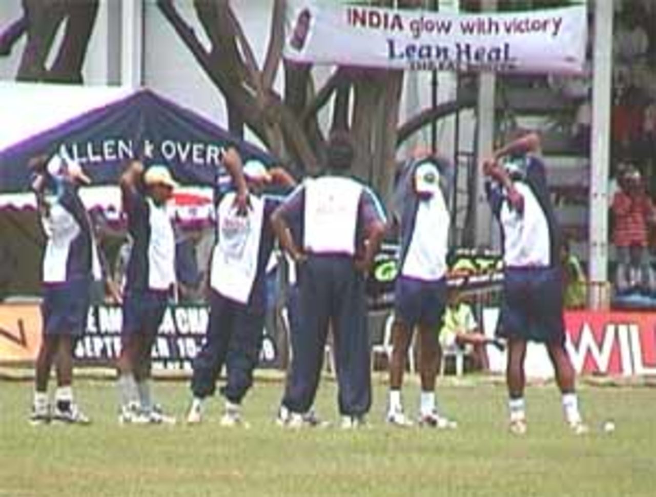 Indians stretching on the Ground, India v West Indies (3rd ODI), Coca-Cola Singapore Challenge, 1999-2000, Kallang Ground, Singapore, 5 Sep 1999.