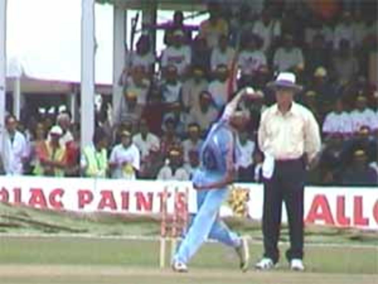 Shukla's bowling action, India v West Indies (3rd ODI), Coca-Cola Singapore Challenge, 1999-2000, Kallang Ground, Singapore, 5 Sep 1999.