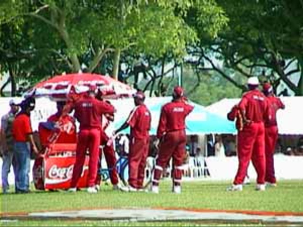 The West Indians enjoy a well deserved drinks break, India v West Indies (3rd ODI), Coca-Cola Singapore Challenge, 1999-2000, Kallang Ground, Singapore, 5 Sep 1999.
