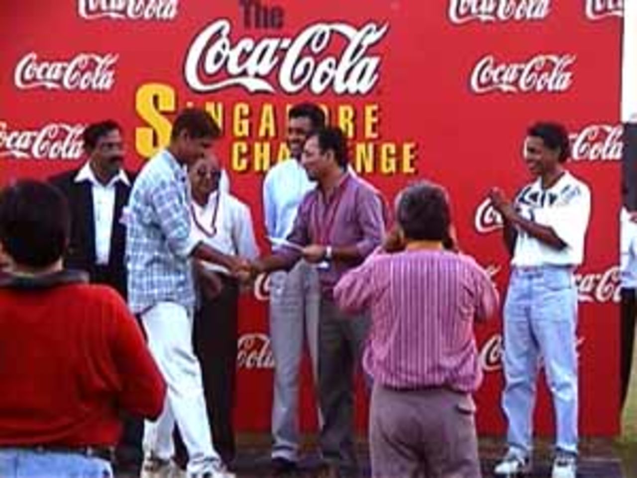 The spectator, richer by $250 for taking a catch in the stands, India v West Indies (3rd ODI), Coca-Cola Singapore Challenge, 1999-2000, Kallang Ground, Singapore, 5 Sep 1999.