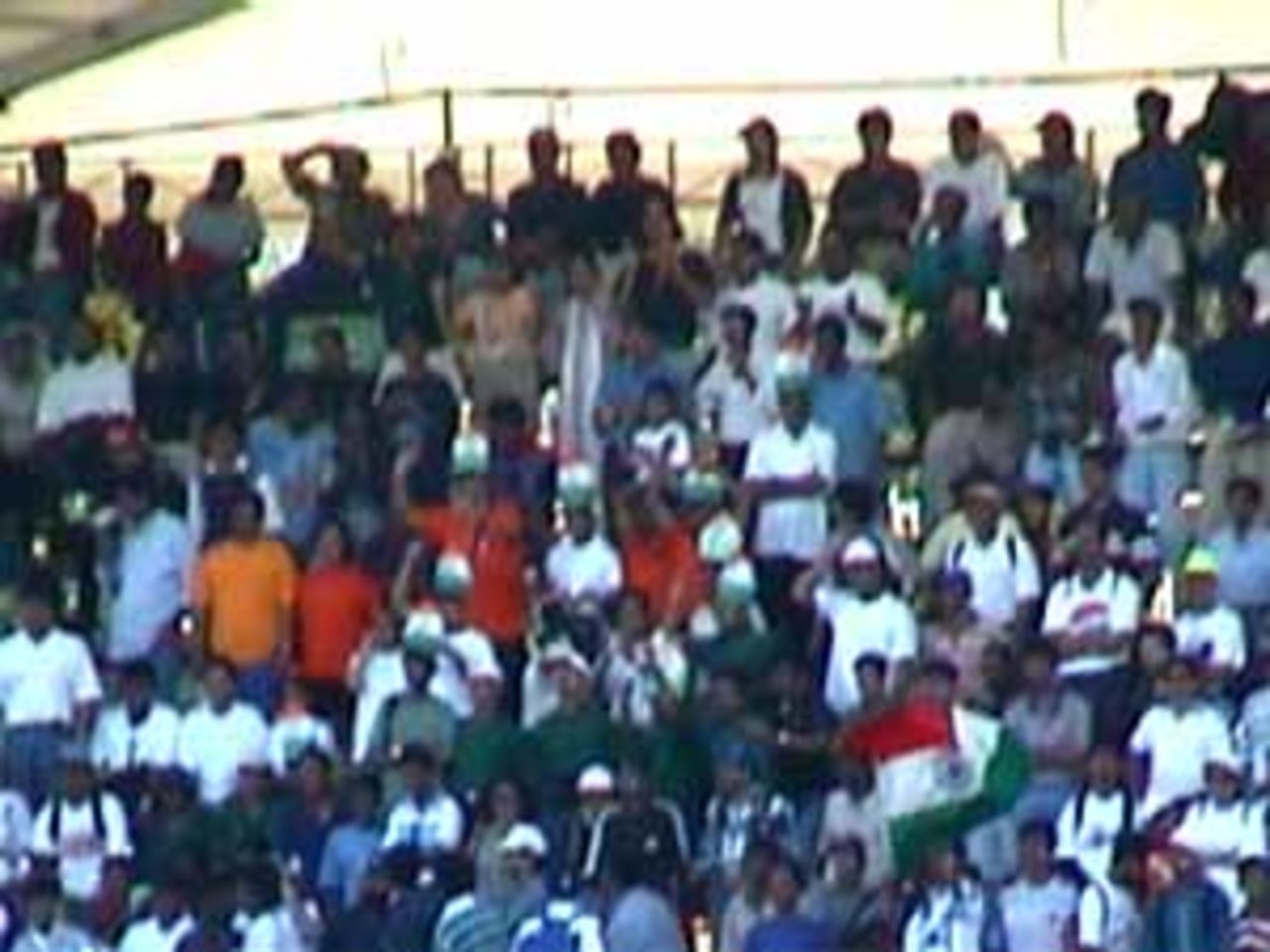 A section of the colourful Singapore crowd at the Kallang, India v West Indies (3rd ODI), Coca-Cola Singapore Challenge, 1999-2000, Kallang Ground, Singapore, 5 Sep 1999.