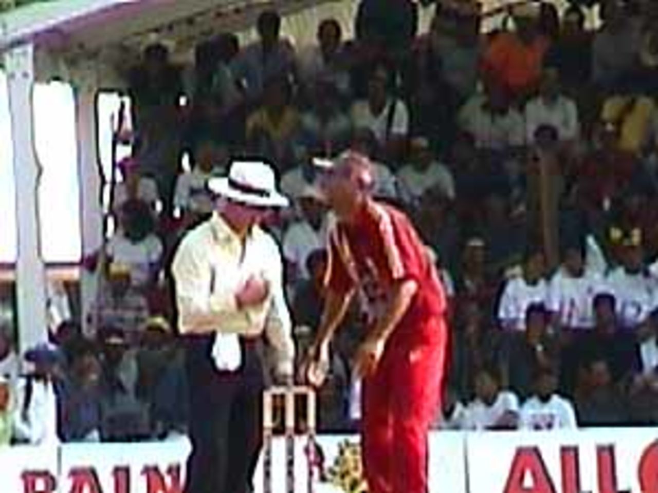 West Indies bowler and Umpire Rudi Koertzen at the stumps, India v West Indies (3rd ODI), Coca-Cola Singapore Challenge, 1999-2000, Kallang Ground, Singapore, 5 Sep 1999.