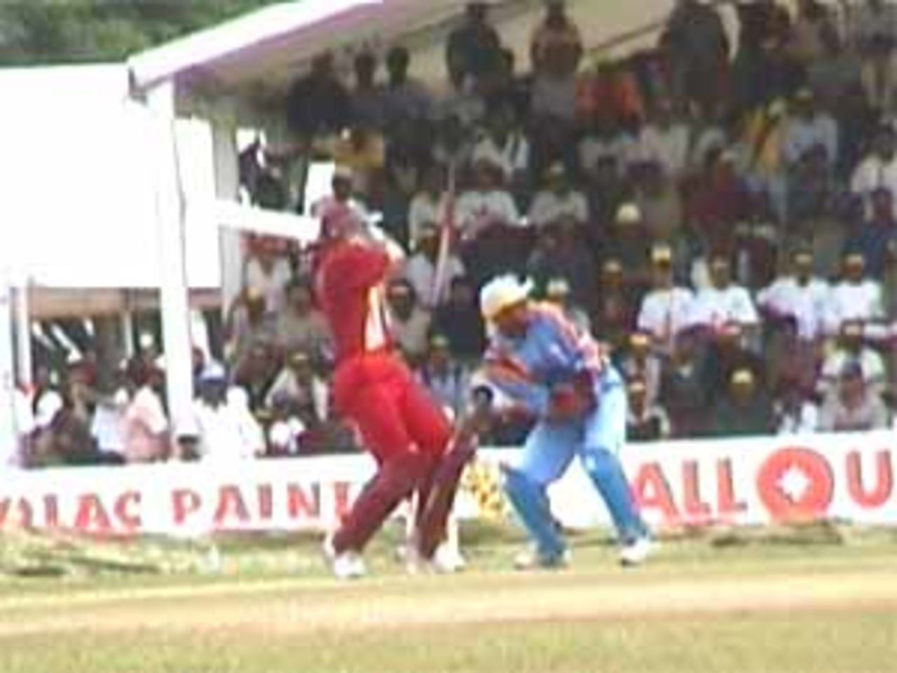 Ricardo Powell sends a ball out of the stadium, India v West Indies (3rd ODI), Coca-Cola Singapore Challenge, 1999-2000, Kallang Ground, Singapore, 5 Sep 1999.
