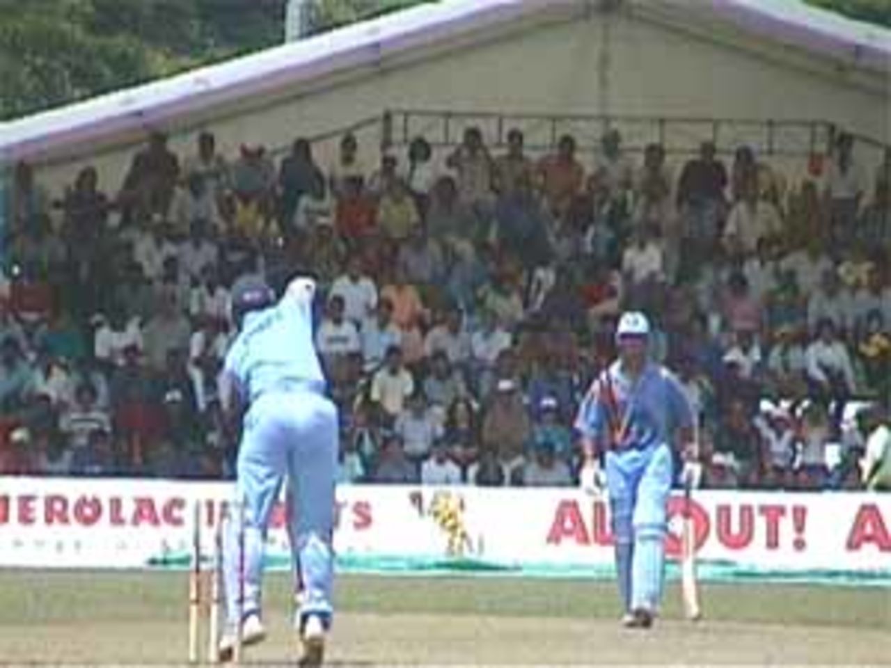 Rahul Dravid looks on as Ganguly defends solidly, India v West Indies (Final), Coca-Cola Singapore Challenge, 1999-2000, Kallang Ground, Singapore, 7 Sep 1999.