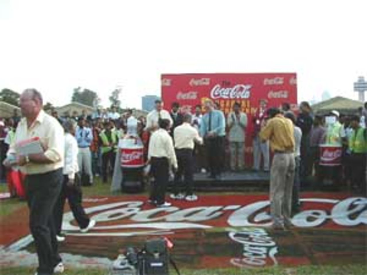 Umpires being recognised for their efforts during the Coca Cola Singapore Challenge Trophy, India v West Indies (Final), Coca-Cola Singapore Challenge, 1999-2000, Kallang Ground, Singapore, 8 Sep 1999.