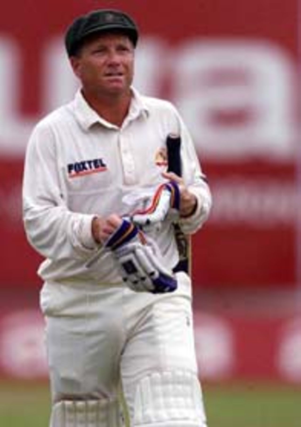 23 Sep 1999: Ian Healy of Australia leaves the field after being dismissed for 4 during day two of the second test between Sri Lanka and Australia at Galle International Stadium, Galle, Sri Lanka.