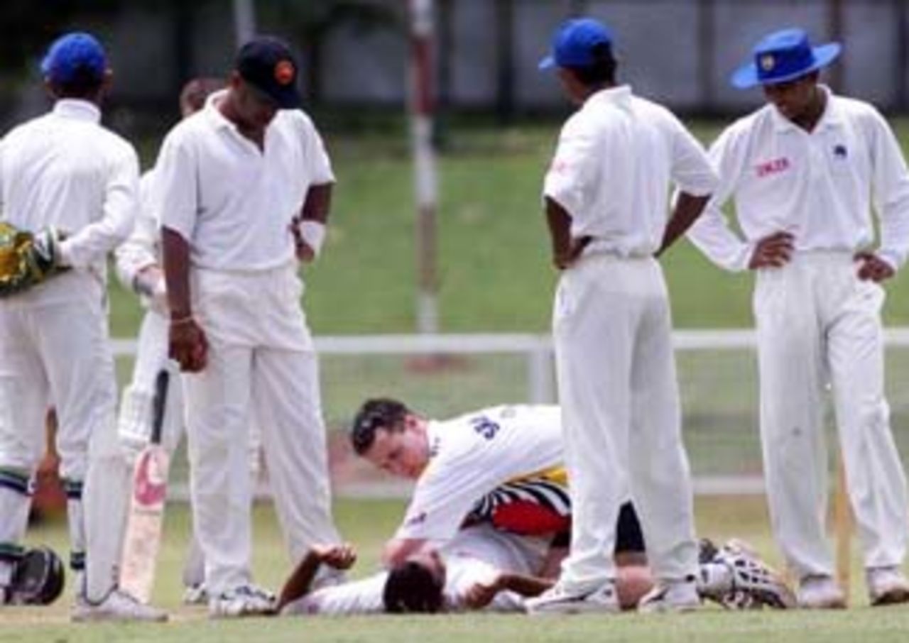 17 Sep 1999: Indike Gallage of the Board XI down injured, during day one of the Tour match between the Sri Lanka Board XI and Australia at Colombo Cricket Club, Colombo, Sri Lanka.
