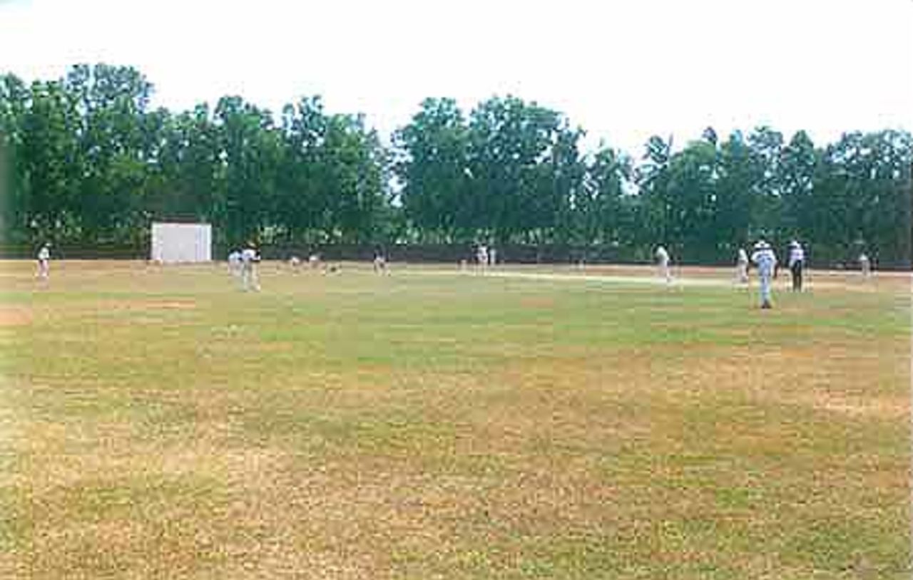 Play in progress during an Under-19 match at the Vellyani Agricultural College Ground