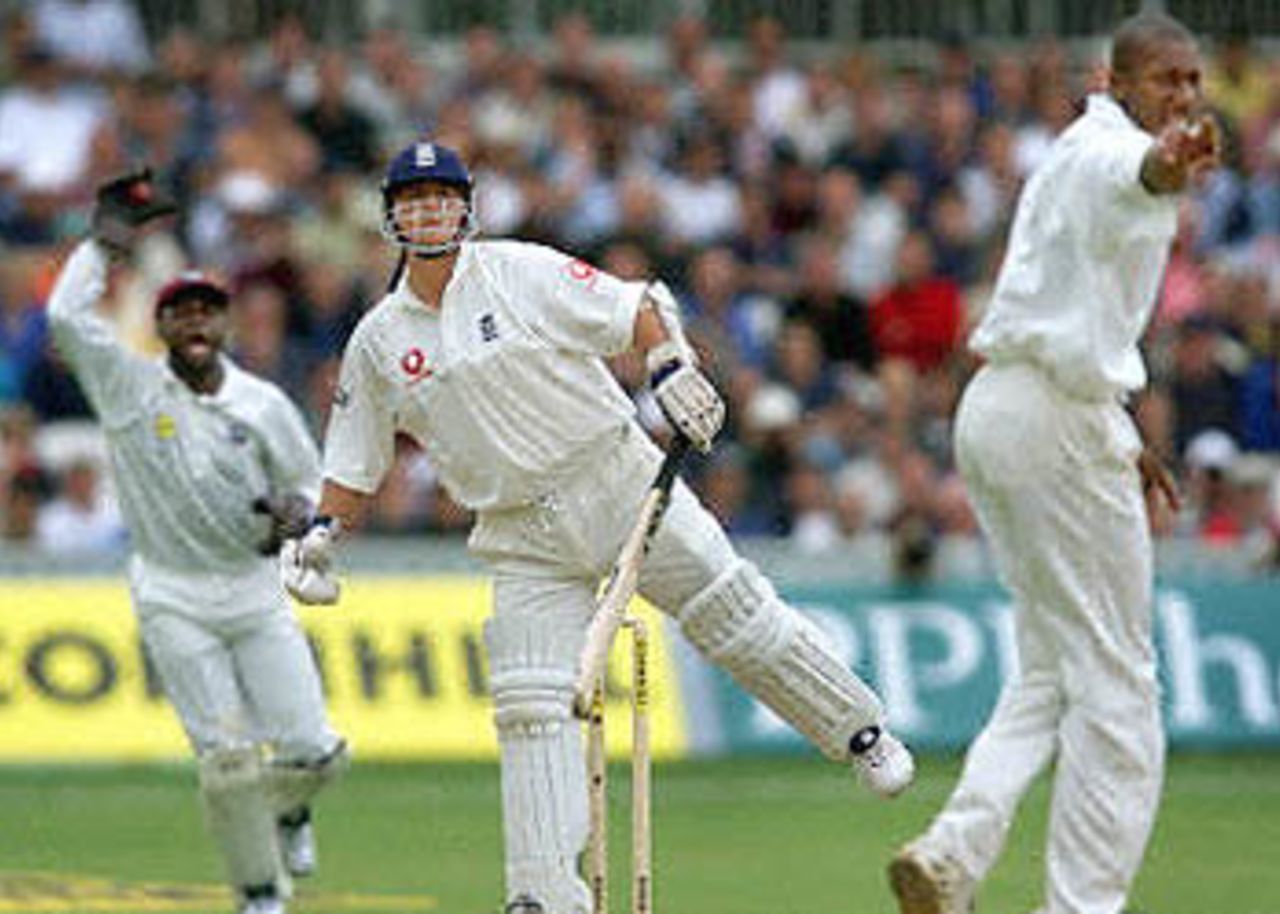 England's Darren Gough (C) survives an appeal from Nixon McLean (R), and wicketkeeper Ridley Jacobs (L) of the West Indies, during the first innings of the fifth Test at The Oval in London. England's were later bowled out for a total of 281 runs. The Wisden Trophy, 2000, 5th Test, England v West Indies, Kennington Oval, London, 31Aug-04Sep 2000 (Day 2).