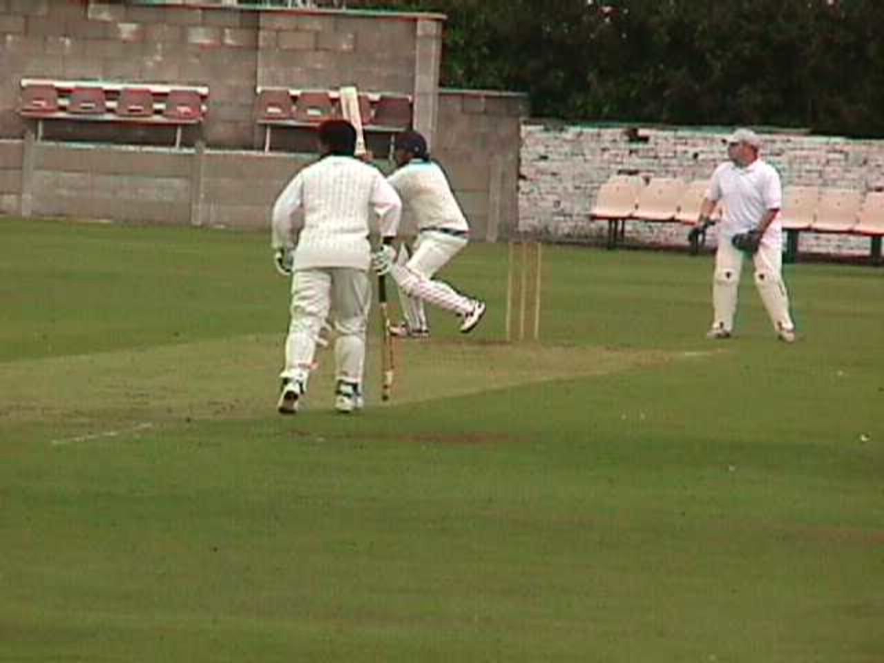 Liquat Khan pulls Mark Saulle to the square leg boundary