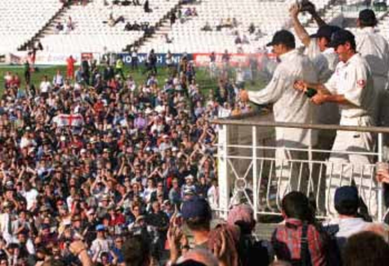 England cricket team spray the crowd with champagne after beating the West Indies in the Fifth Test at the Oval in London 04 September 2000. England won the five-match series 3-1 breaking the longest running losing streak in test cricket. The Wisden Trophy, 2000, 5th Test, England v West Indies, Kennington Oval, London, 31Aug-04Sep 2000 (Day 5).