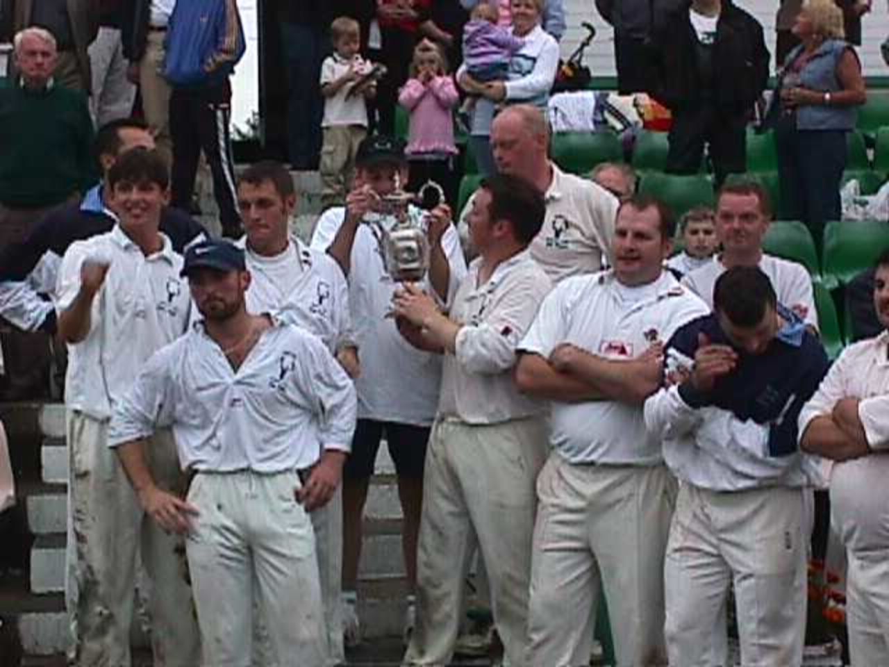 Now its the turn of the Bacup team to examine their hard earned trophy
