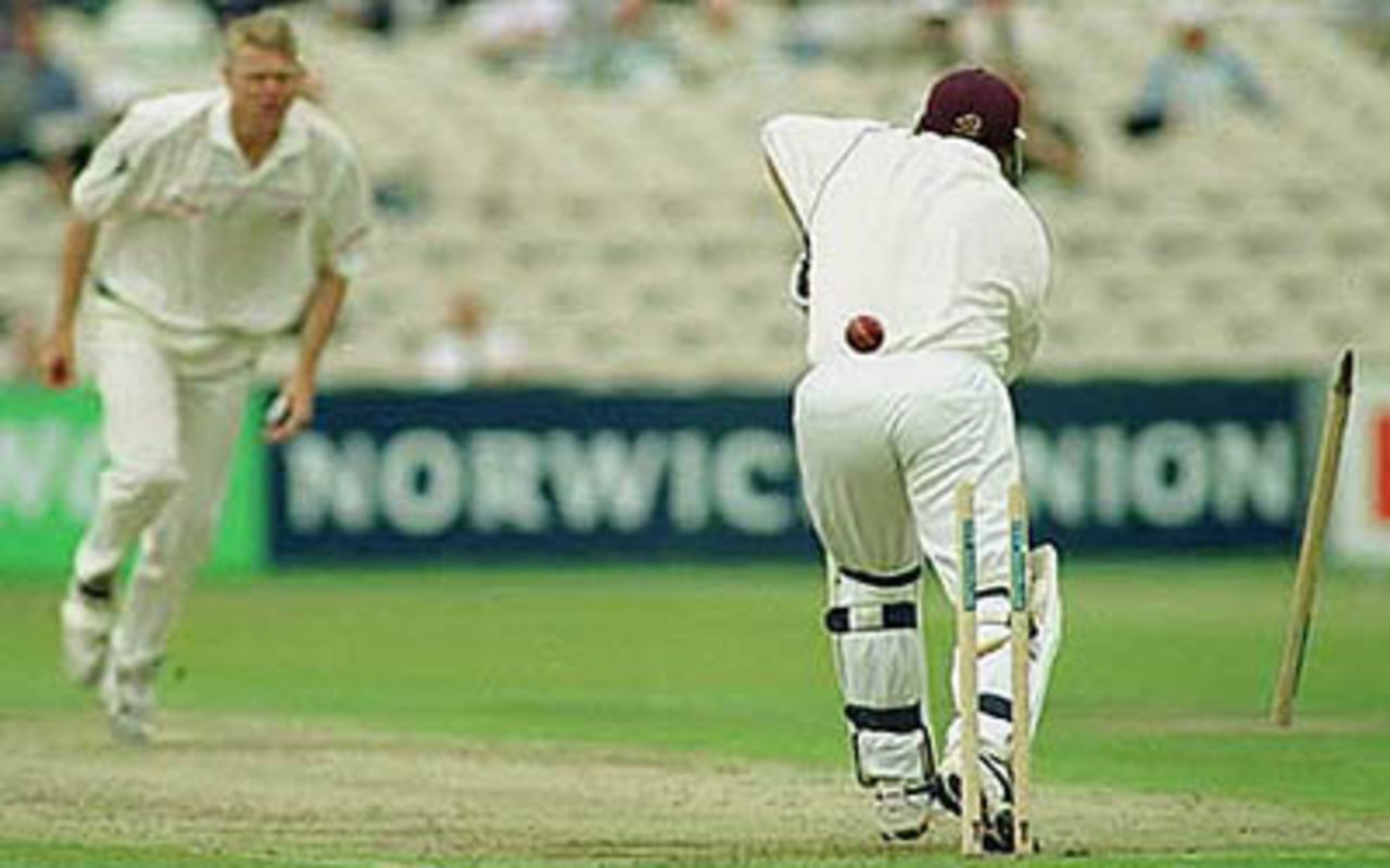 Peter Martin sends Mark Lathwell's stump flying, PPP healthcare County Championship Division One, 2000, Lancashire v Somerset, Old Trafford, Manchester, 08-10 September 2000 (Day 1).