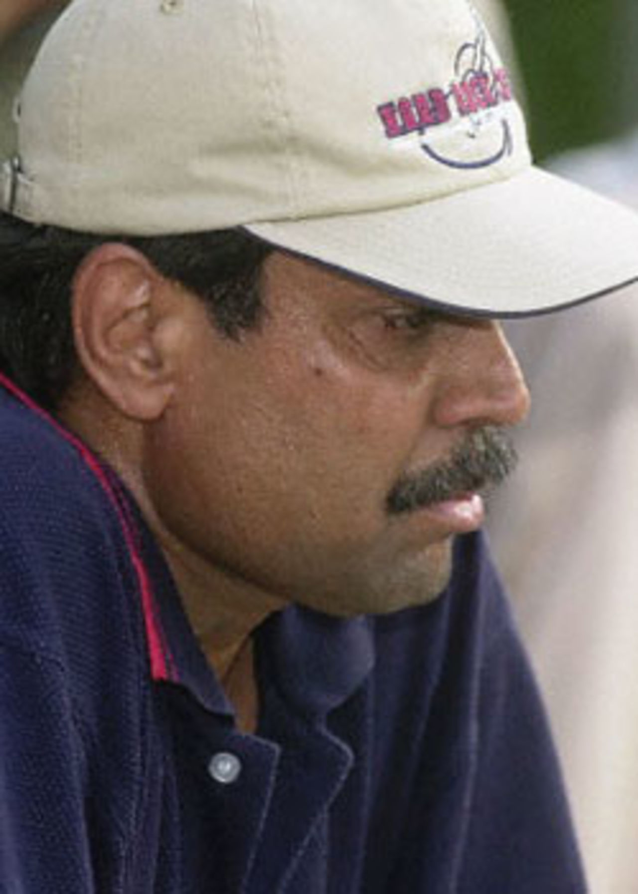 Indian cricketing legend Kapil Dev in a pensive moment at a golf club in New Delhi after resigning as the Indian cricket team coach 12 September 2000. Dev, who is in the centre of a match-fixing and corruption probe, had earlier said 'he is clean, but finished with cricket' . Dev had led India to victory in the 1983 World Cup in England and has played 225 one-dayers, scoring 3783 runs and claiming 253 wickets.