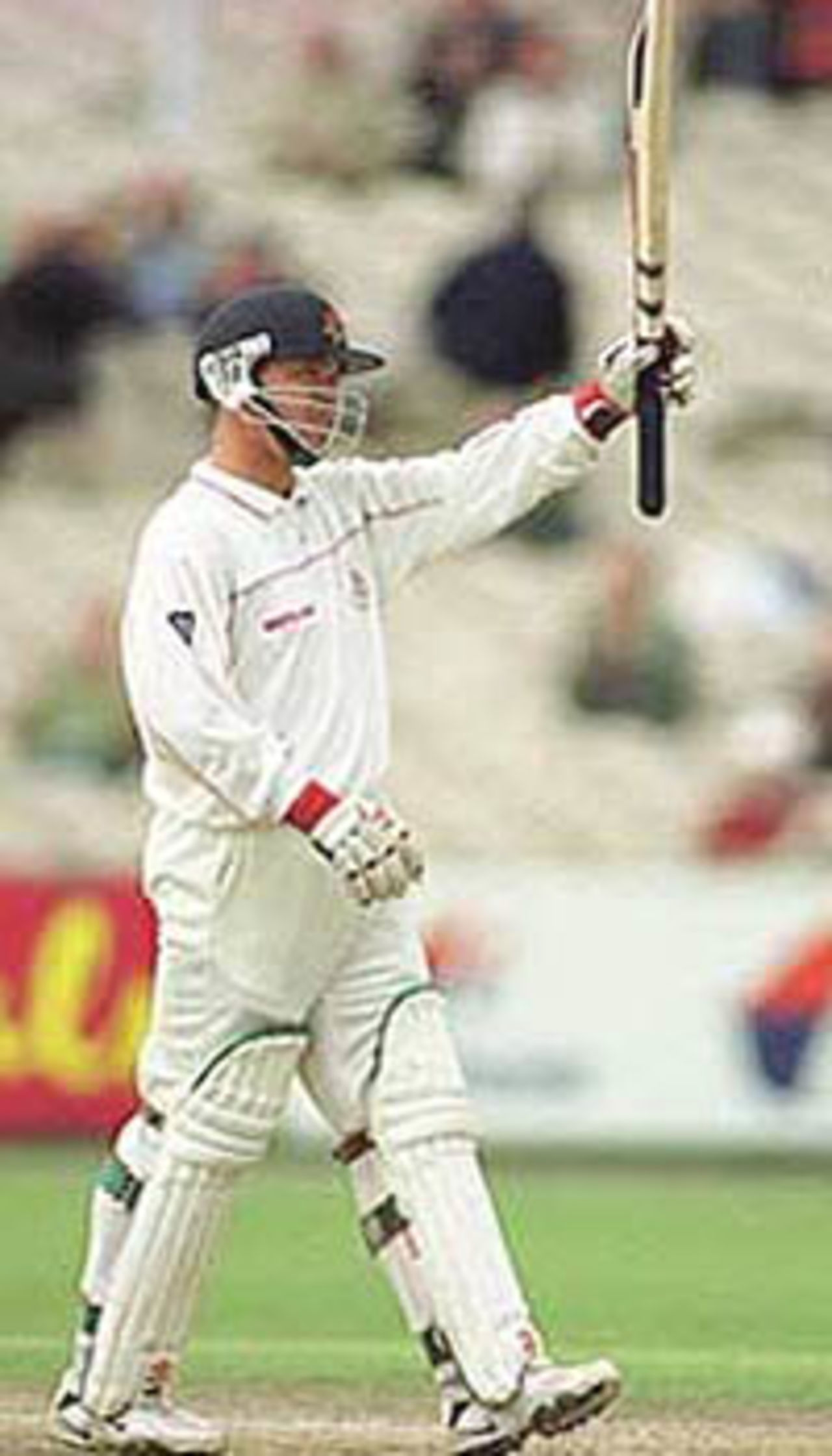 Warren Hegg raises bat in acknowledgement after reaching 50, PPP healthcare County Championship Division One, 2000, Lancashire v Surrey, Old Trafford, Manchester, 13-16 September 2000(Day 1).
