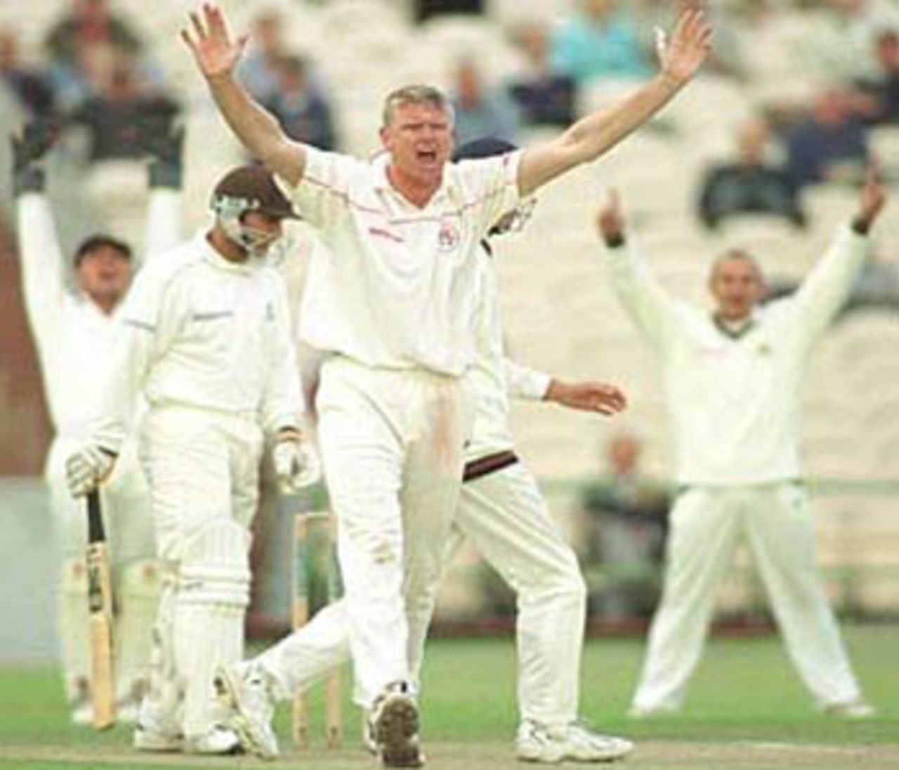 Peter Martin appeals successfully for LBW against Mark Butcher, PPP healthcare County Championship Division One, 2000, Lancashire v Surrey, Old Trafford, Manchester, 13-16 September 2000(Day 1).
