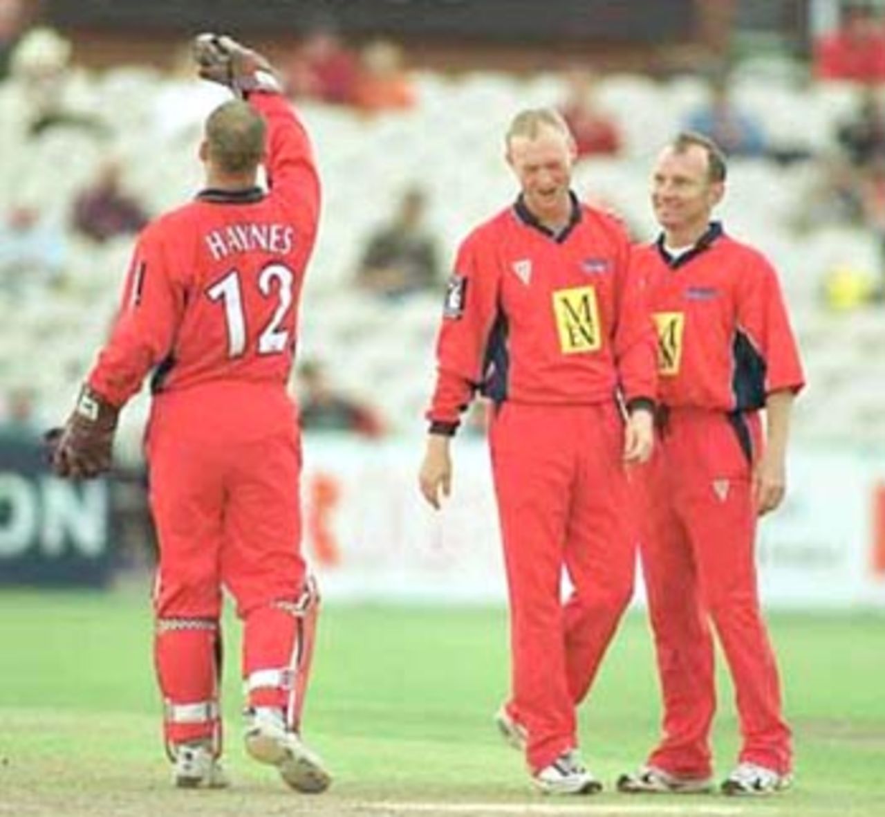 Gary Keedy congratulated by Neil Fairbrother. National League Division One 2000, Lancashire v Sussex, Old Trafford, Manchester 17 Sep 2000