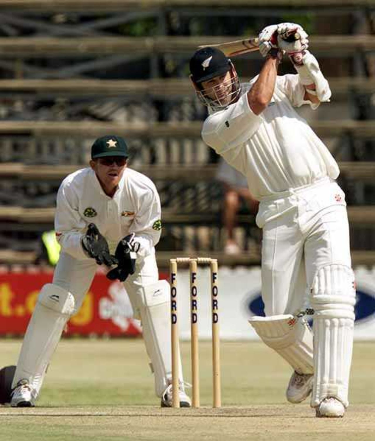 New Zealander Chris Cairns hits for four on his way to his fourth Test hundred