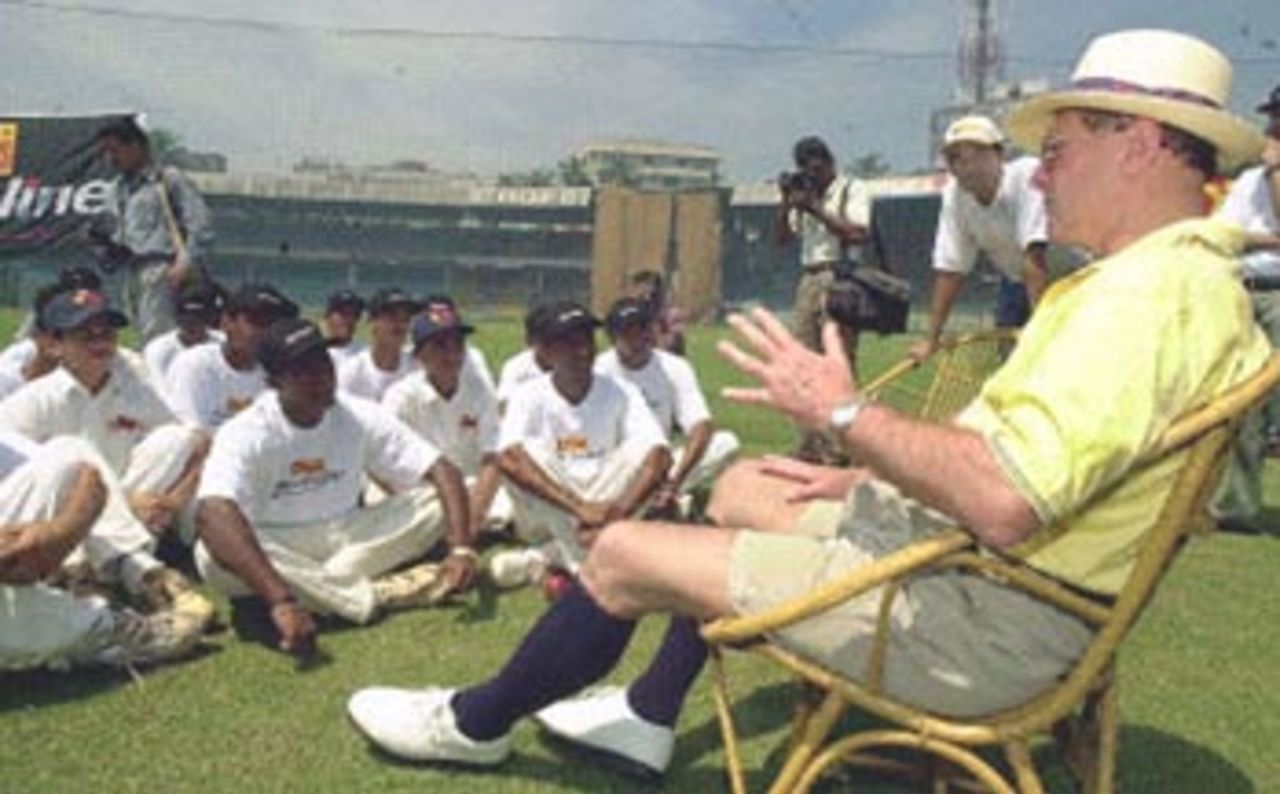 Leading cricket analyst and former British cricket player Geoffrey Boycott (R) talks to young and promising cricketers 23 September 2000 at the Wankhede stadium in Bombay. Boycott has signed a three-year exclusive contract with ESPN (TV Sports channel) and will make his debut on the STAR Sports on SPORTLINE the exclusive half-hour news programme from 25 September this year.
