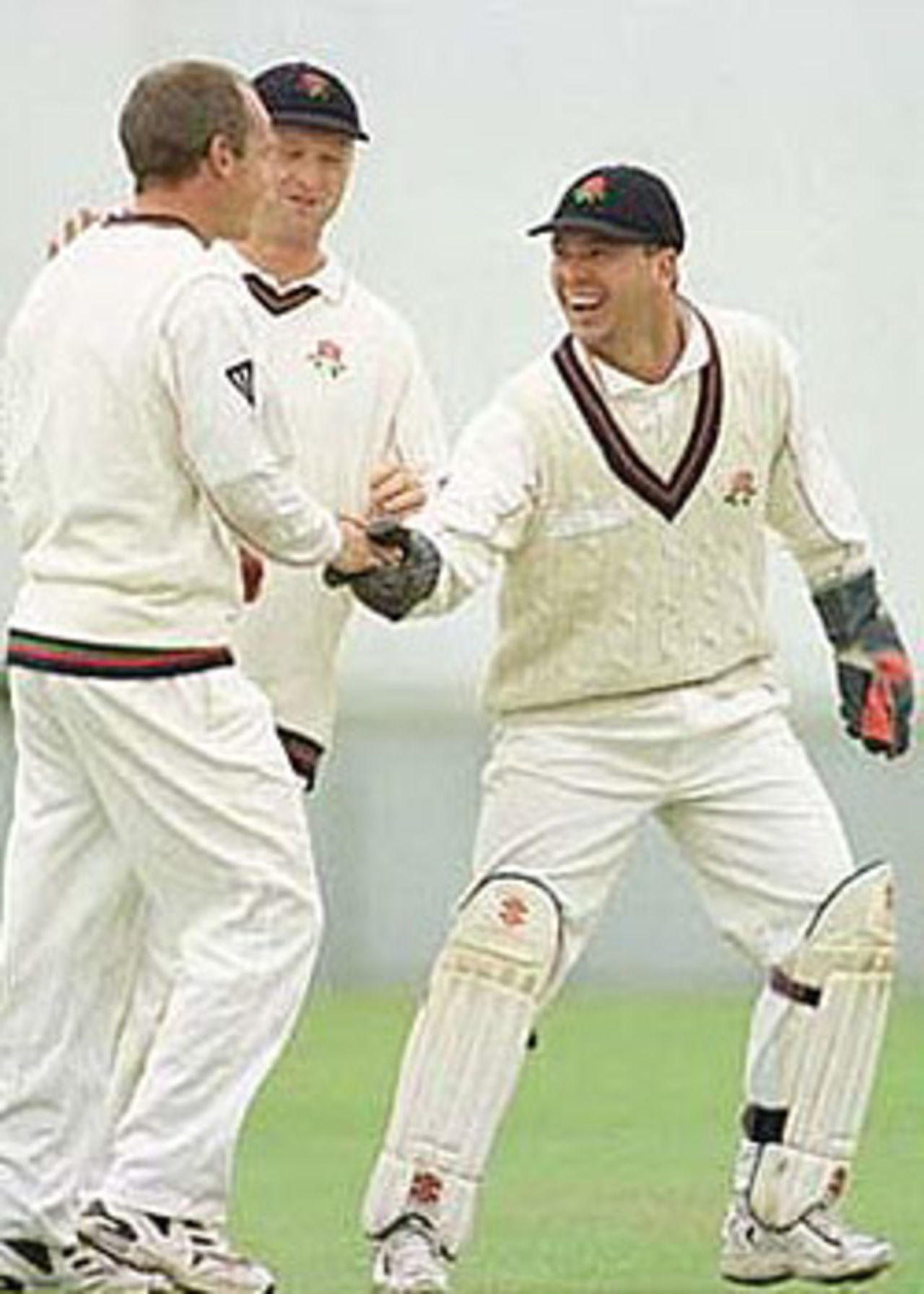 Hegg and Lloyd celebrate the wicket of Alistair Brown, PPP healthcare County Championship Division One, 2000, Lancashire v Surrey, Old Trafford, Manchester, 13-16 September 2000(Day 2).