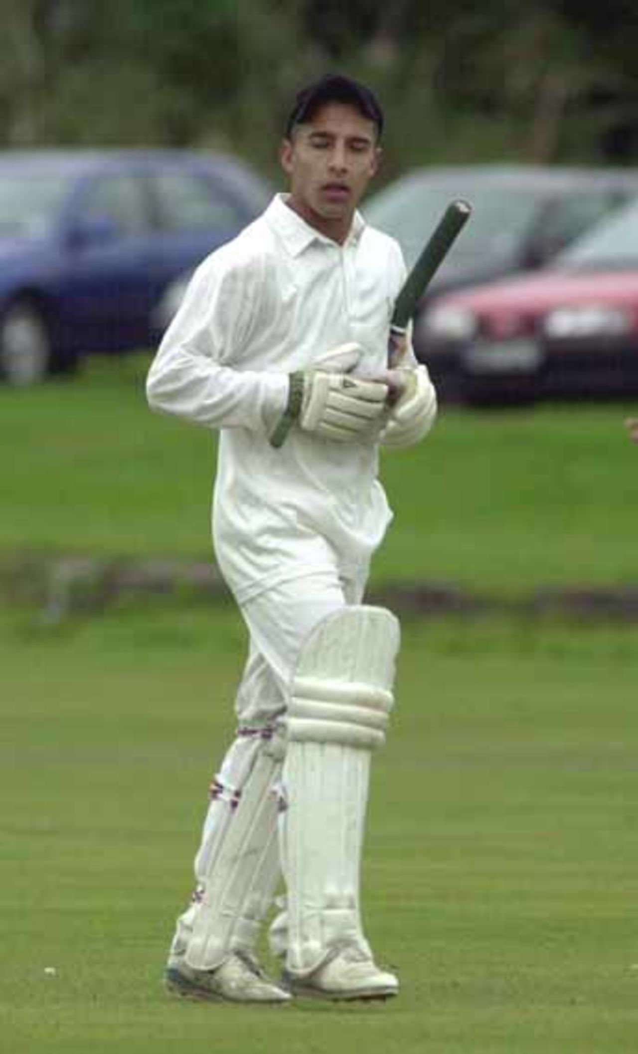 Khizer Hayatt leaves the crease after being caught by Zaed Hussain
