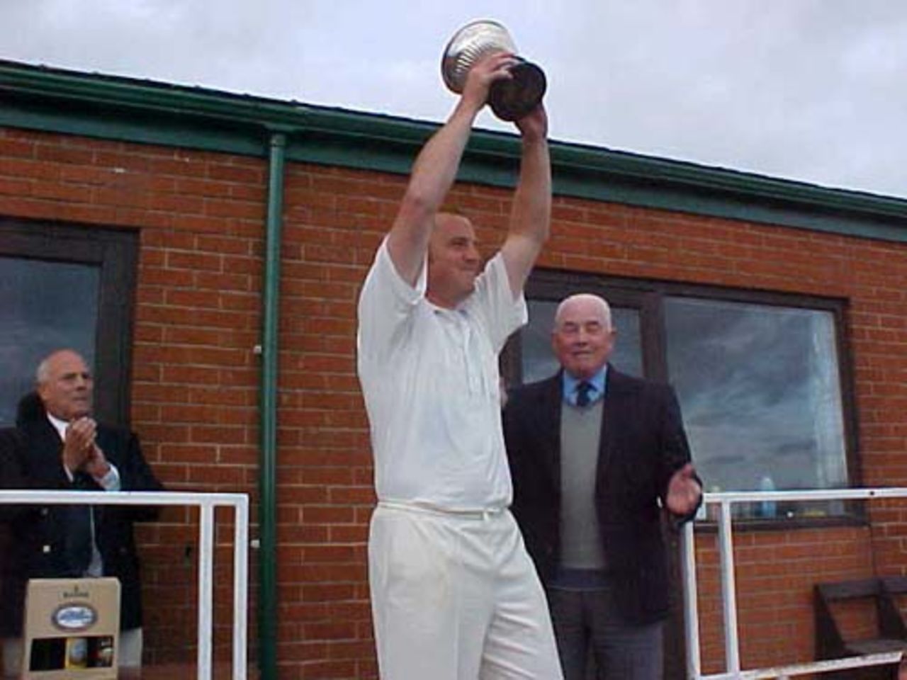 Great Harwood skipper Paul Houldsworth with the Ramsbottom Cup