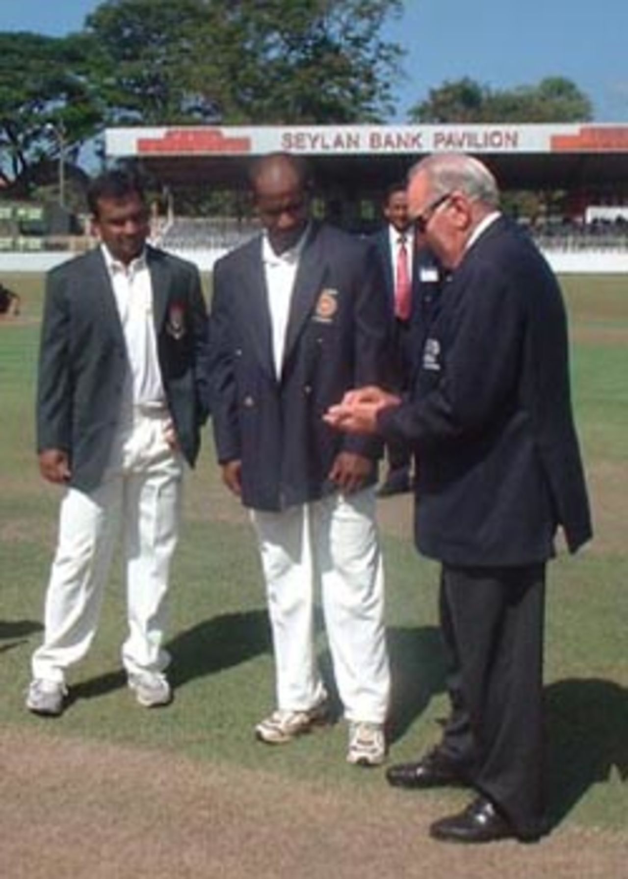 The Match Referee takes the coin out to toss for the inaugural Test match between the two countries, Asian Test Championship 2001-02, 2nd Match, Sri Lanka v Bangladesh, Sinhalese Sports Club Ground, Colombo.