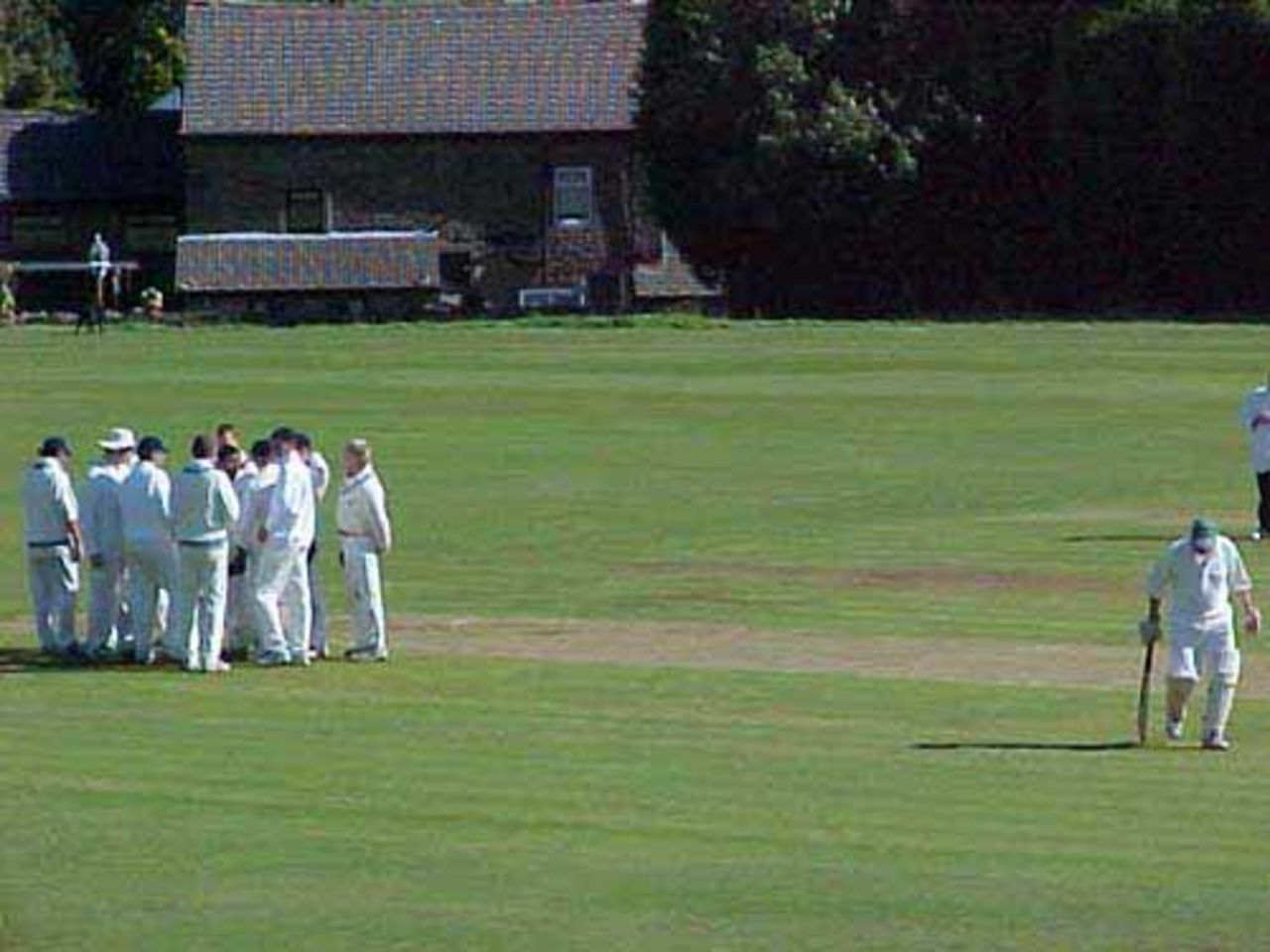 Chris Hanson leaves the field after falling lbw to Farhan Adil