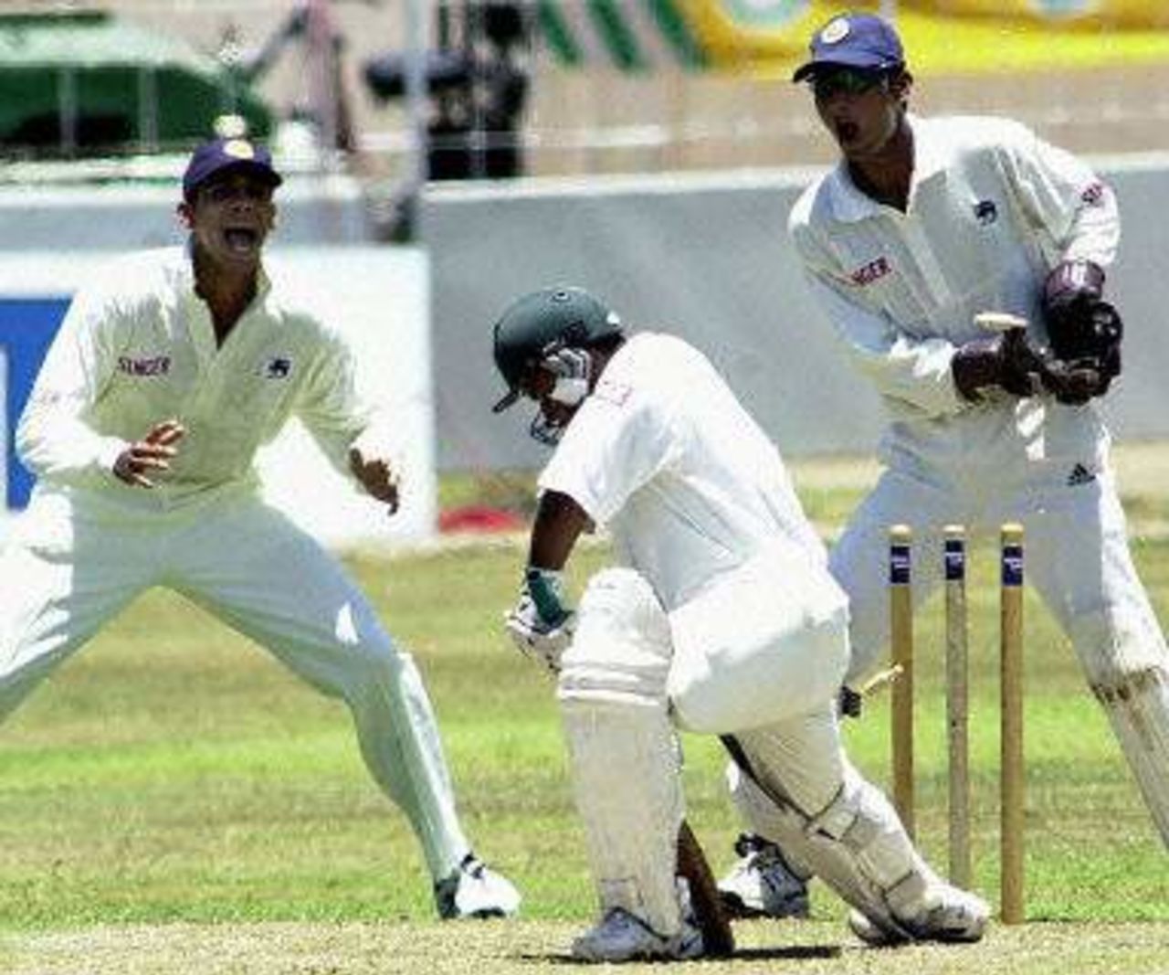 Murali gets the better of Bangladeshi captain Naimur Rahman as Vandort and Sangakkara watch, Asian Test Championship 2001-02, 2nd Match, Sri Lanka v Bangladesh, Sinhalese Sports Club Ground, Colombo.