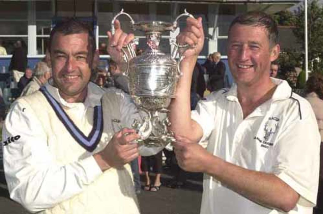 Professional and captain with coveted trophy