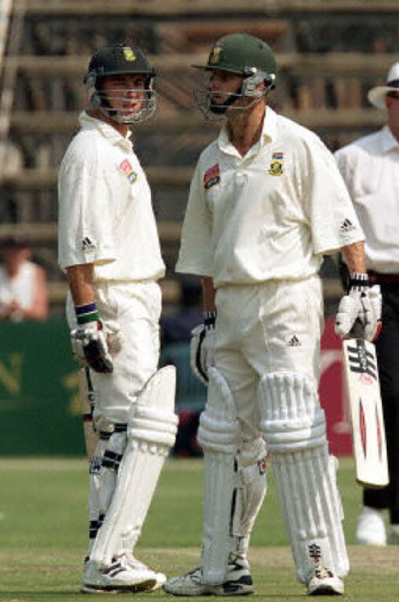 Herschelle Gibbs and Gary Kirsten talk between overs, Ist Test South Africa v Zimbabwe, 7-11 September 2001, at Harare.