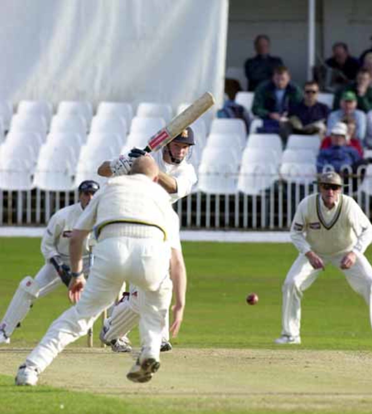 Richard Clinton drives a  ball back only for bowler Hoggard to get down to field it, Scarborough 14th Sep 2001