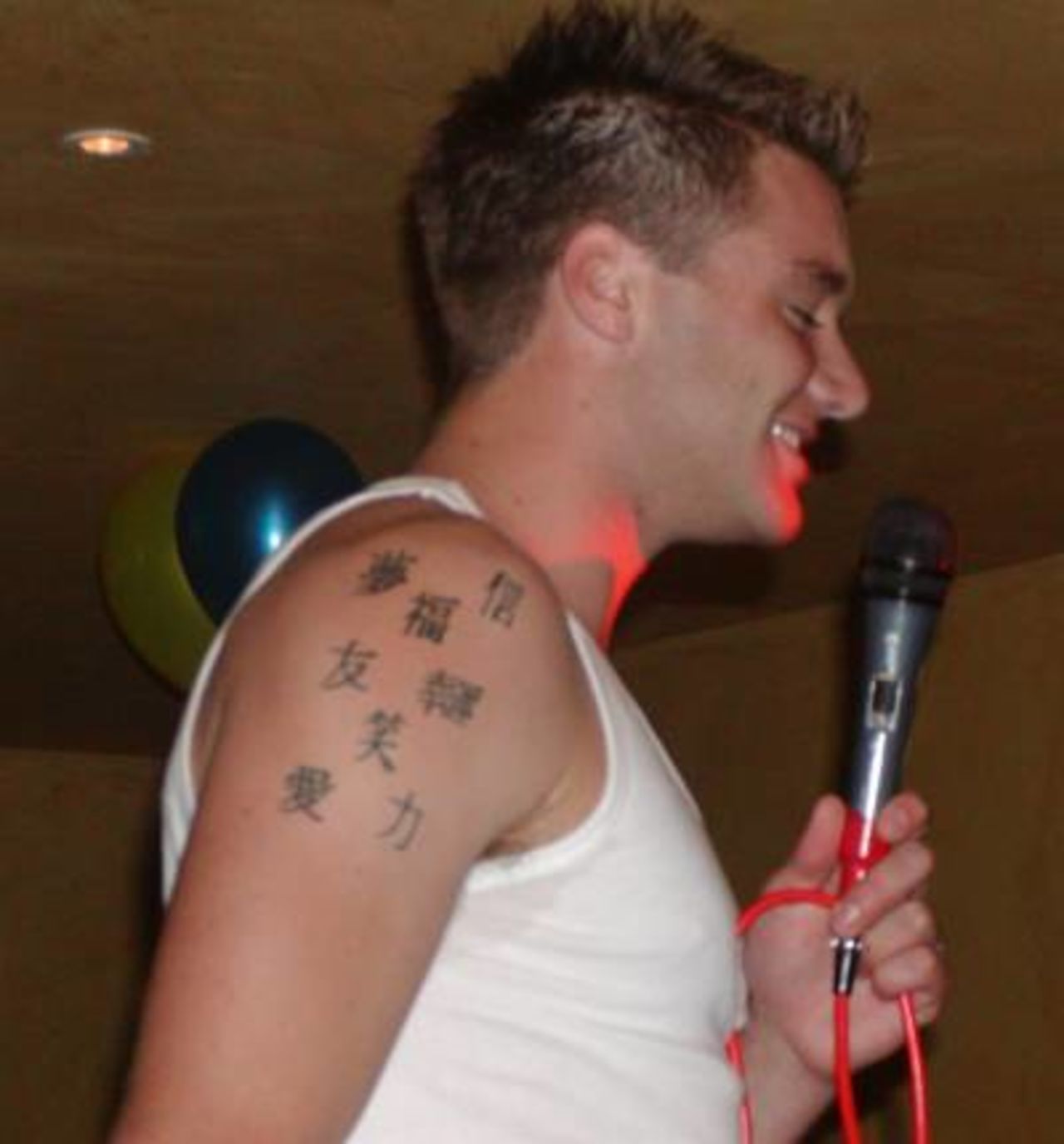 Zac Morris as Robbie Williams - - Hants end of season party 2001