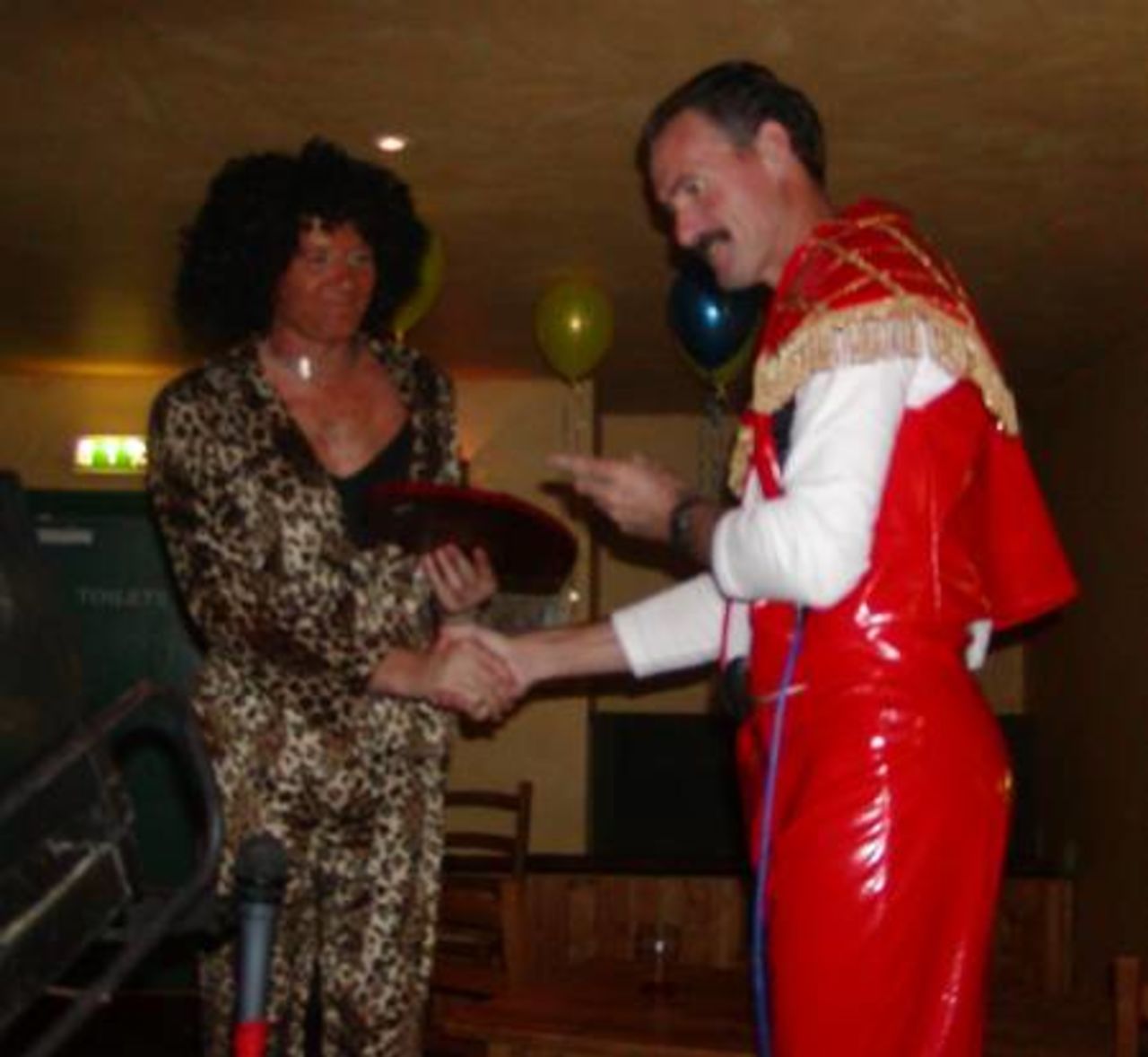Jimmy Cook presents Shaun Udal with the Hampshire Players player award 2001 at Hants end of season party