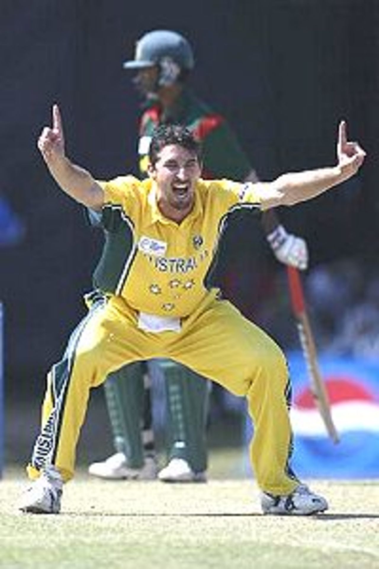 COLOMBO - SEPTEMBER 19: Jason Gillespie of Australia appeals successfully for the wicket of Al Sahariar of Bangladesh during the ICC Champions Trophy match between Australia and Bangladesh played at the SSC Stadium in Colombo, Sri Lanka on September 19, 2002.