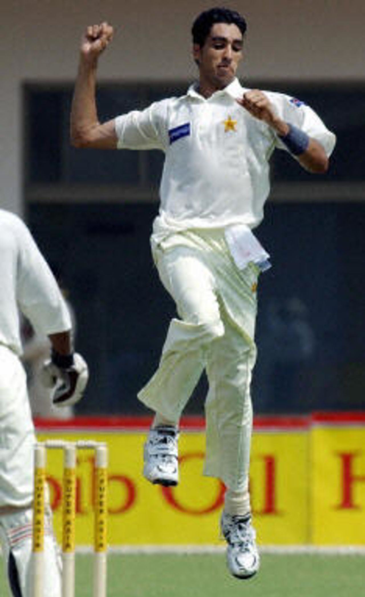 Umar Gul jumps as he celebrates after a dismissal, Pakistan v Bangladesh, 3rd Test, Multan, September 3, 2003.