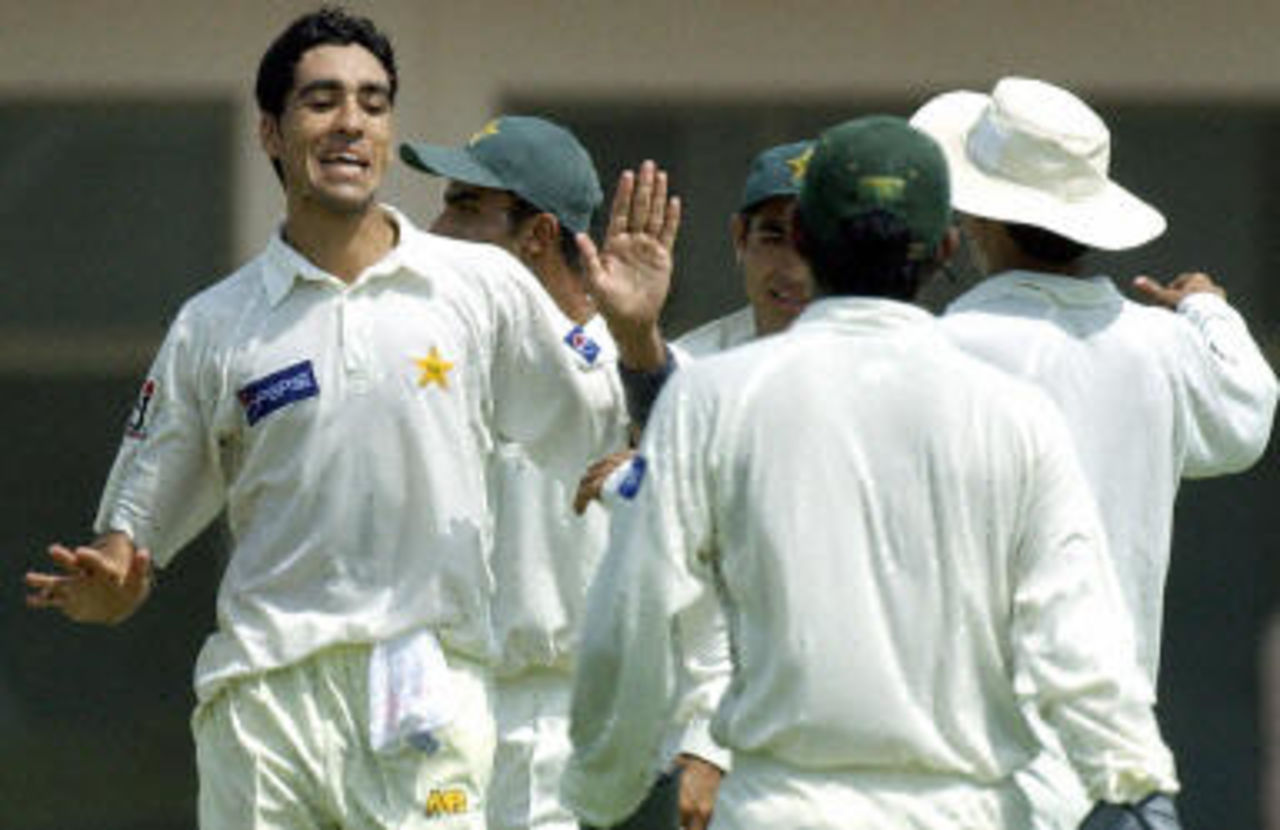 Umar Gul celebrates with his teammates, Pakistan v Bangladesh, 3rd Test, Multan, September 3, 2003.
