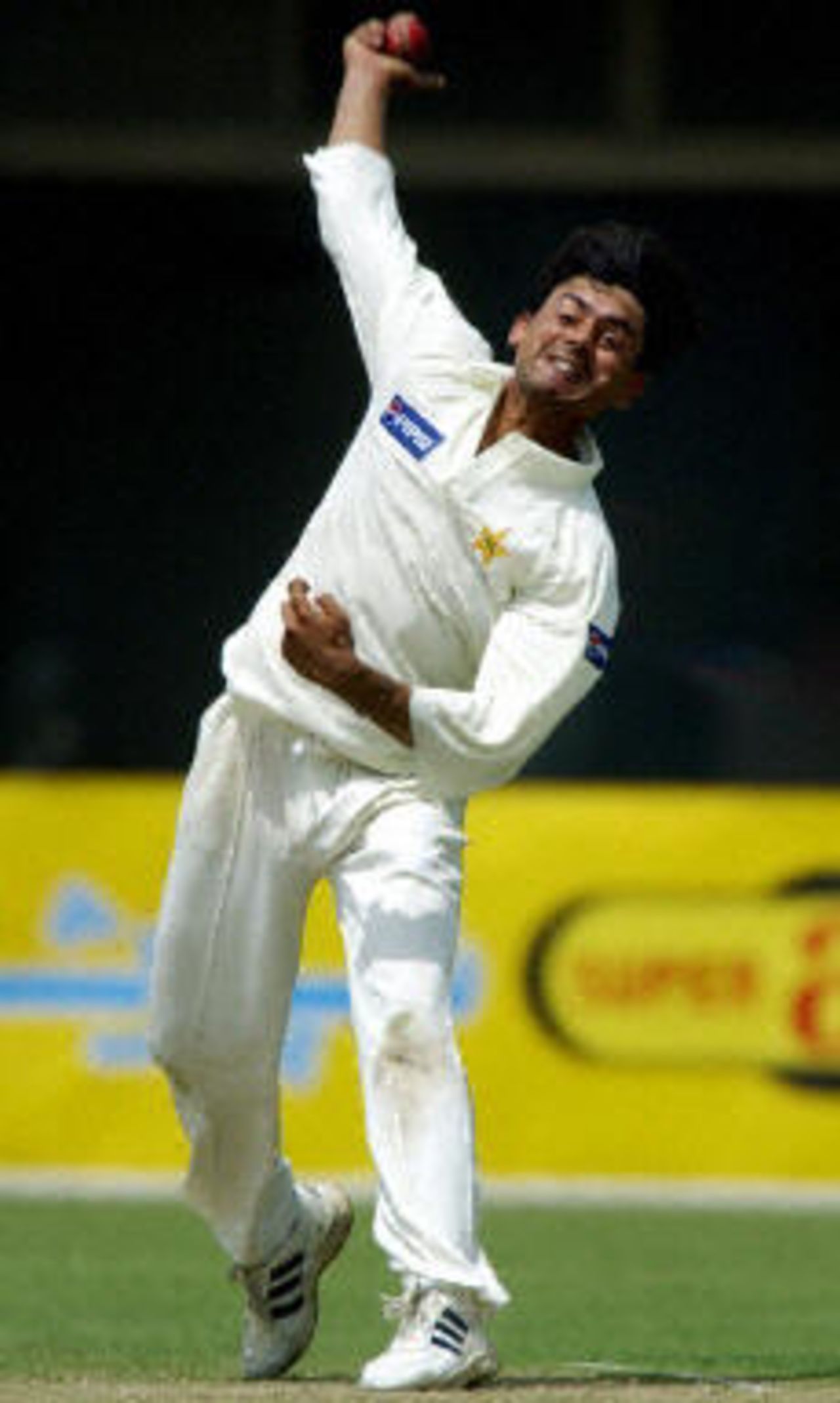 Saqlain Mushtaq delivers a ball, Pakistan v Bangladesh, 3rd Test, Multan, September 3, 2003.