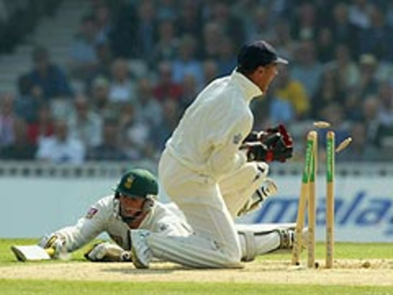 Alec Stewart runs out Graeme Smith, but England were made to struggle on the first morning at The Oval