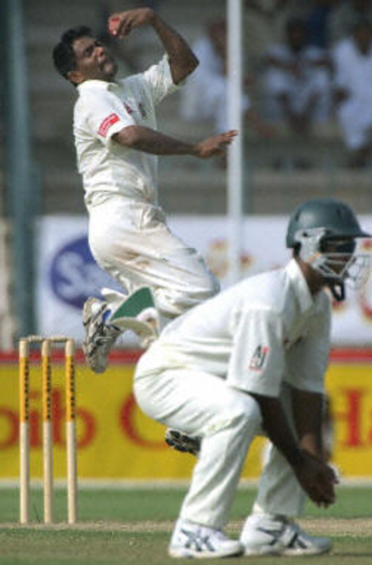 Mohammad Rafique delivers a ball, Pakistan v Bangladesh, 3rd Test, Multan, September 4, 2003.