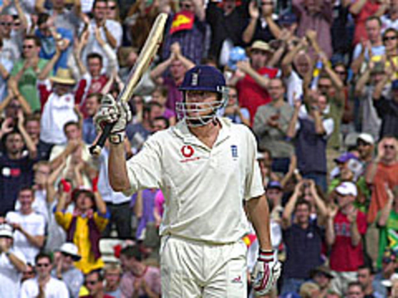 Andrew Flintoff salutes the crowd during his dazzling 95 which gave England a handy lead in the final npower Test at The Oval