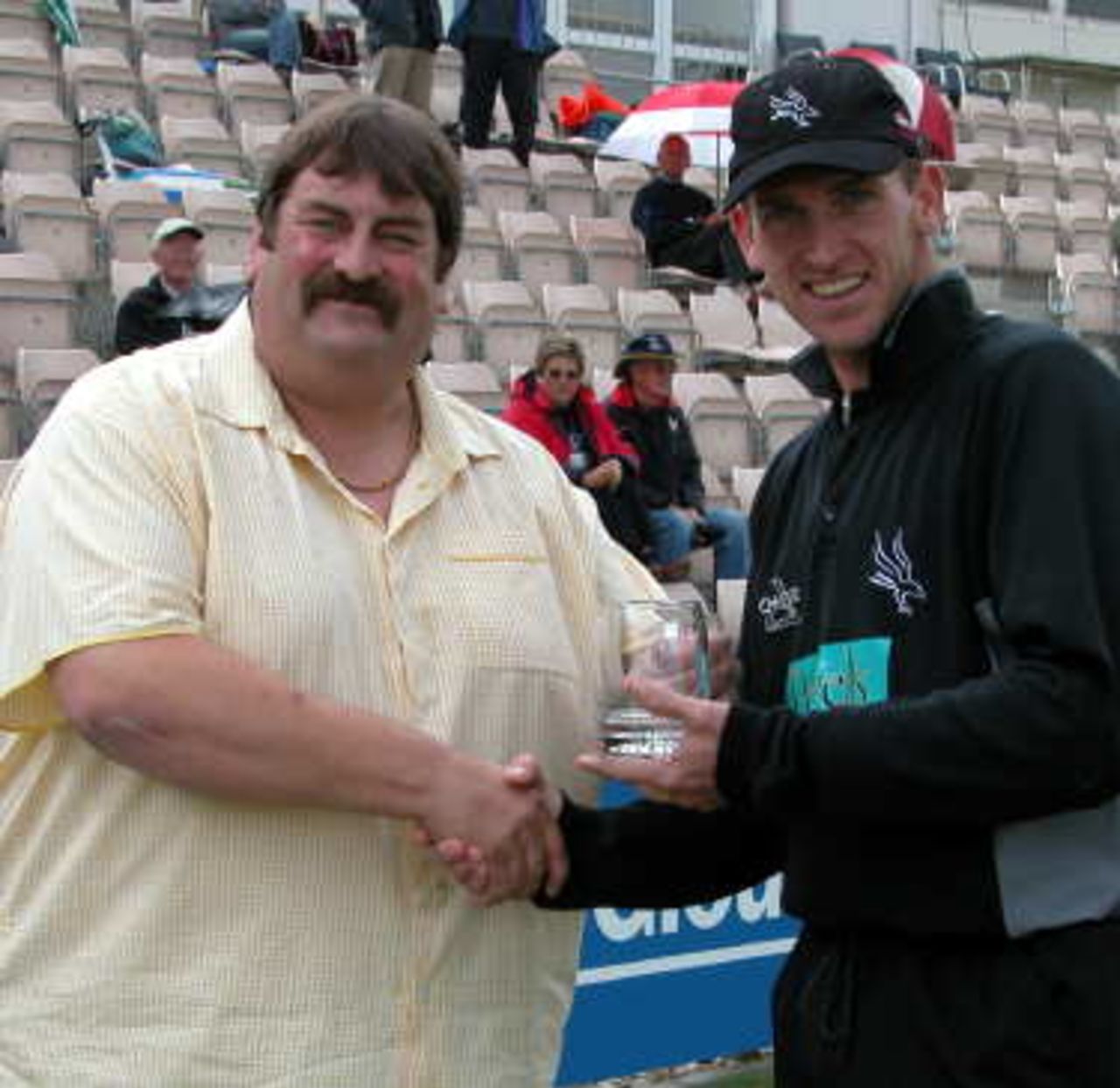 John Crawley receives the August Courage Player of the Month award for from Steve Smith.