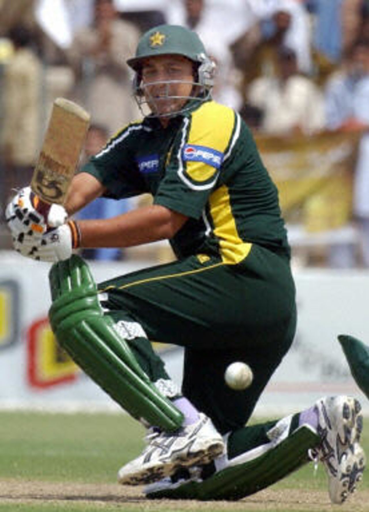 Inzamam-ul-Haq sweeps on his way to a fifty, Pakistan v Bangladesh, 1st ODI, Multan, September 9, 2003.