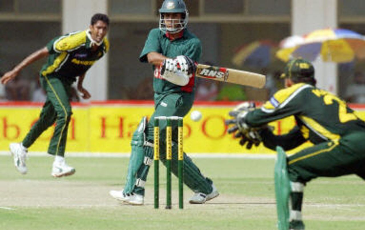 Tushar Imran turns Shabbir Ahmed as Kamran Akmal dives, Pakistan v Bangladesh, 1st ODI, Multan, September 9, 2003.