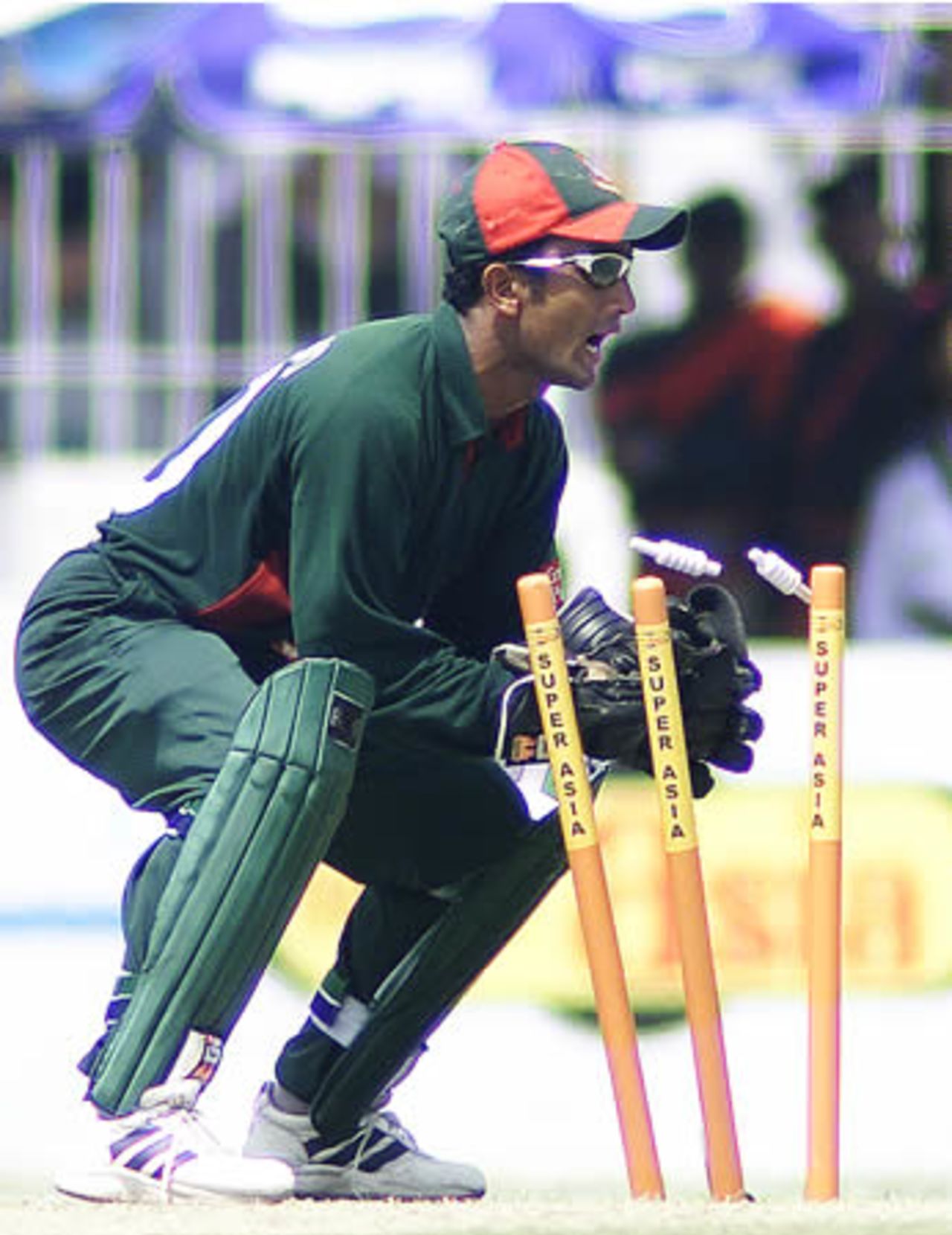 Bangladesh wicketkeeper Khaled Mashud in action, Pakistan v Bangladesh, 2nd ODI, Faisalabad, September 12, 2003.