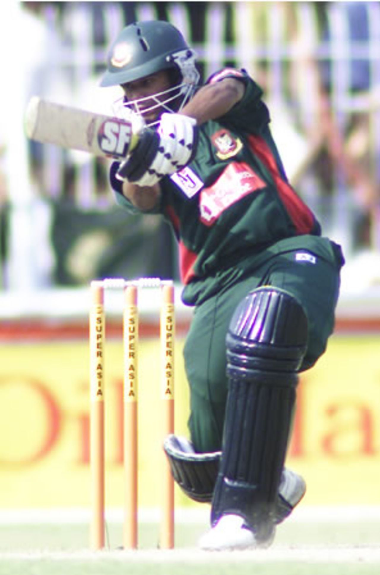 Rajin Saleh coverdrives on his way to 64, Pakistan v Bangladesh, 2nd ODI, Faisalabad, September 12, 2003.