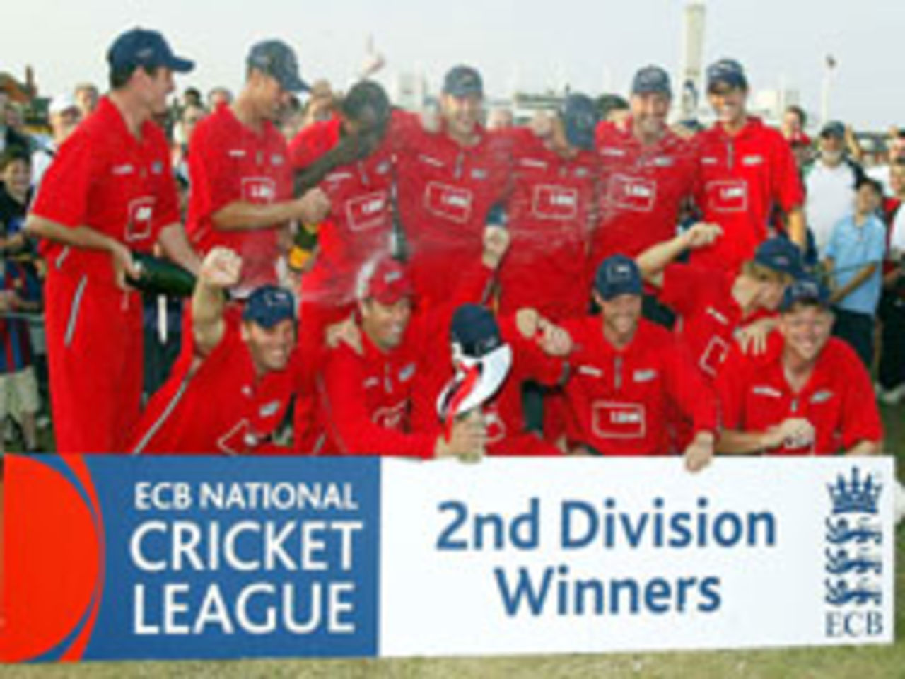 Lancashire team celebrate promotion to Div Two, v Northants, National League, Wantage Road, September 21, 2003